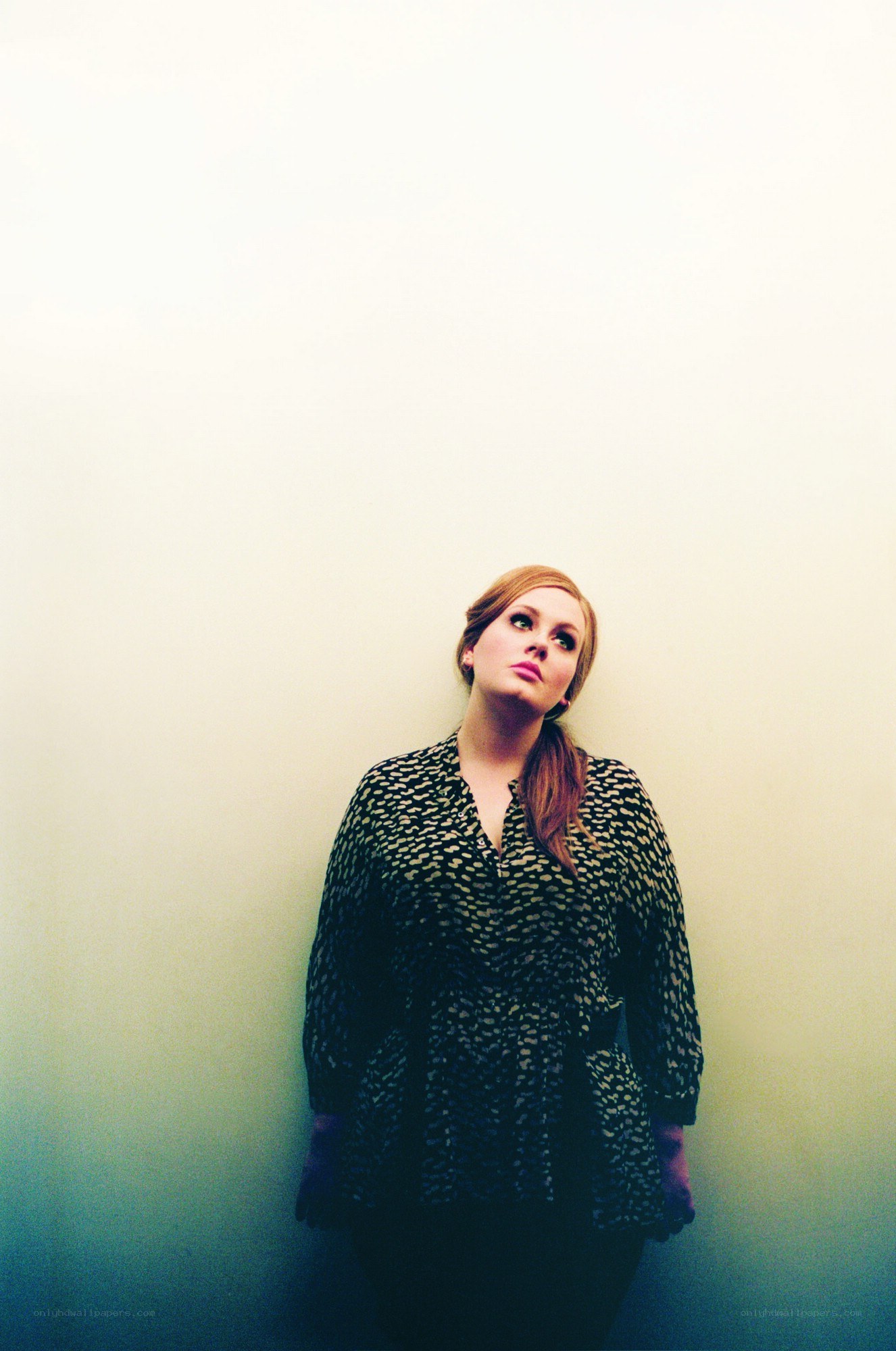 woman in patterned blouse