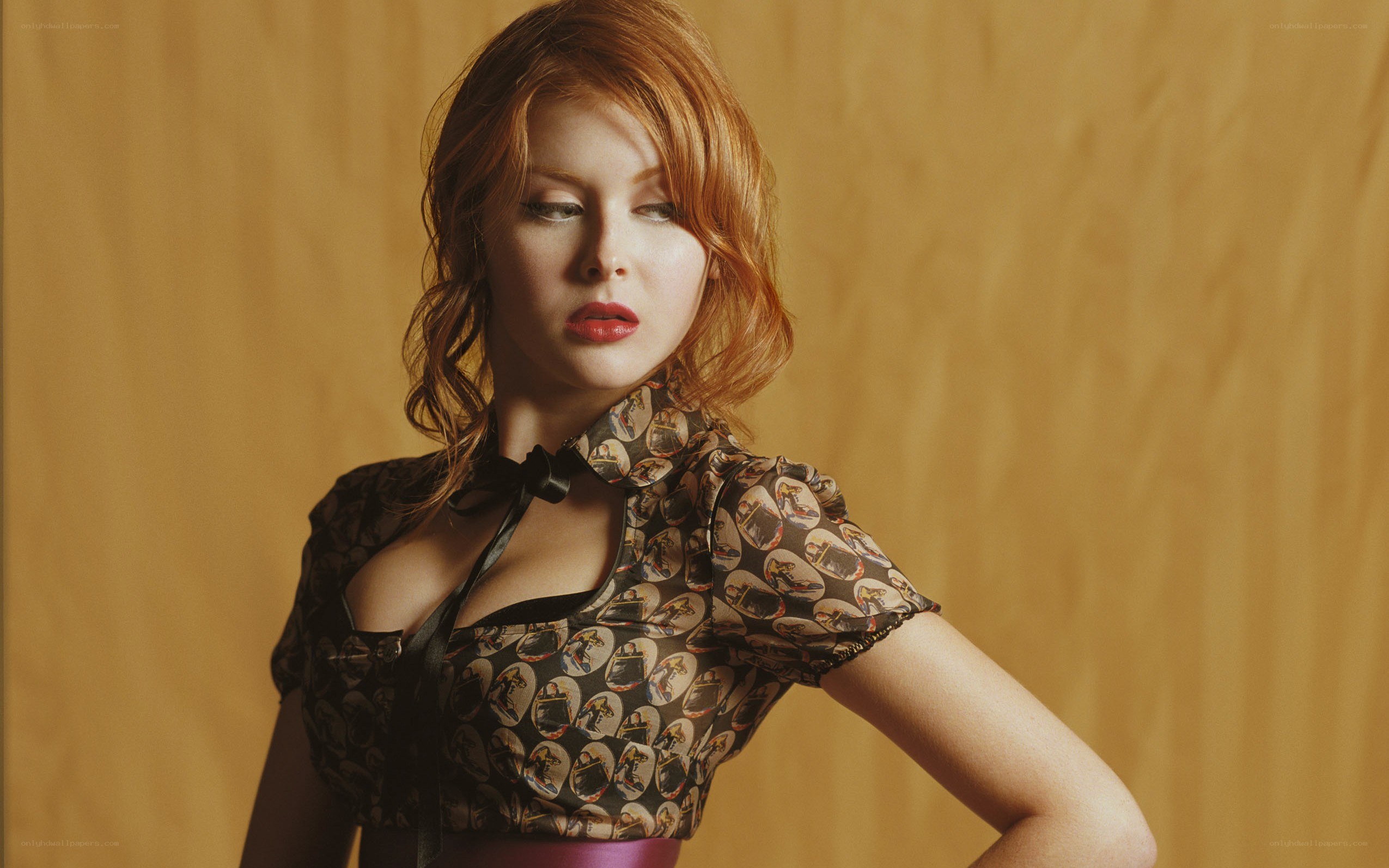 woman in patterned blouse
