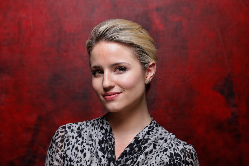 woman in patterned blouse