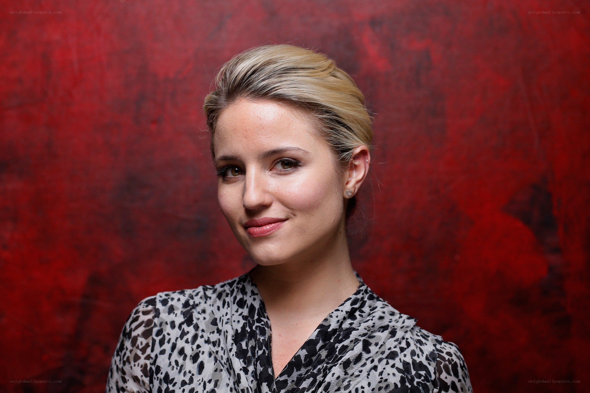 woman in patterned blouse