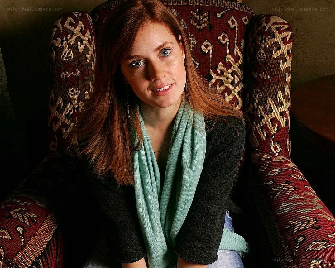 woman in patterned chair