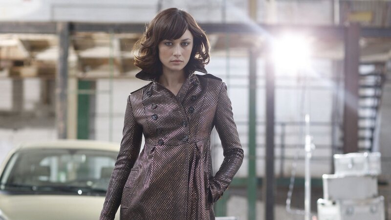 woman in patterned coat