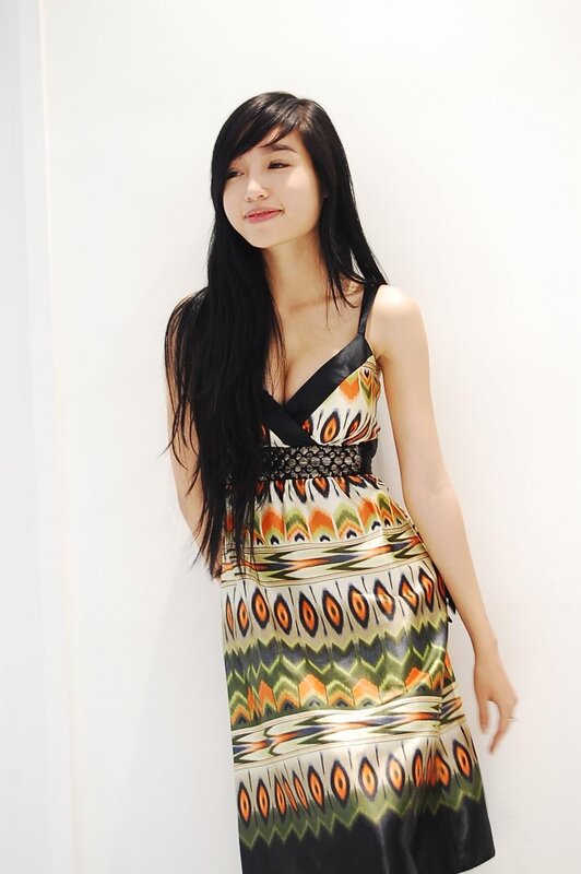 woman in patterned dress