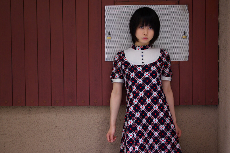 woman in patterned dress