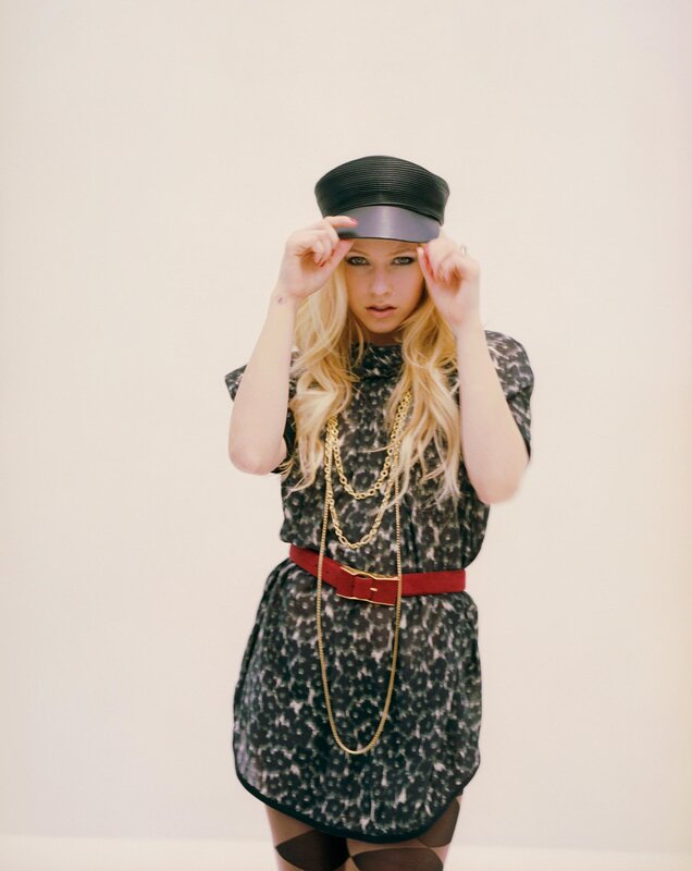 Woman in Patterned Dress — Black, Confident, Photograph, Hat, Gold Chains