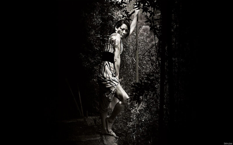 Woman in Patterned Dress — Black, Dramatic, Night, Photograph