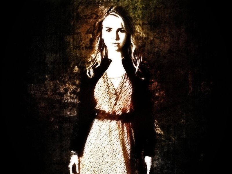Woman in Patterned Dress — Black, Dramatic, Photograph, Coat