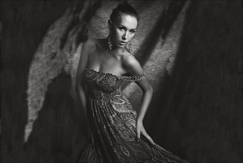 Woman in Patterned Dress — Black, Dramatic, Photograph, Earrings, Studio Lighting