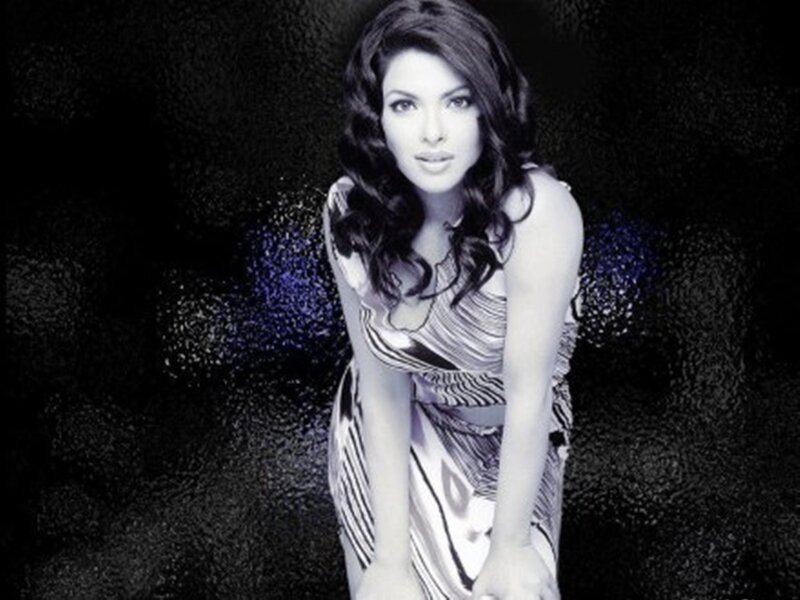 Woman in Patterned Dress — Black, Dramatic, Photograph, Hair, Background