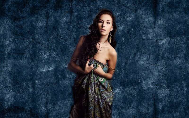 Woman in Patterned Dress — Blue, Dramatic, Photograph, Earrings