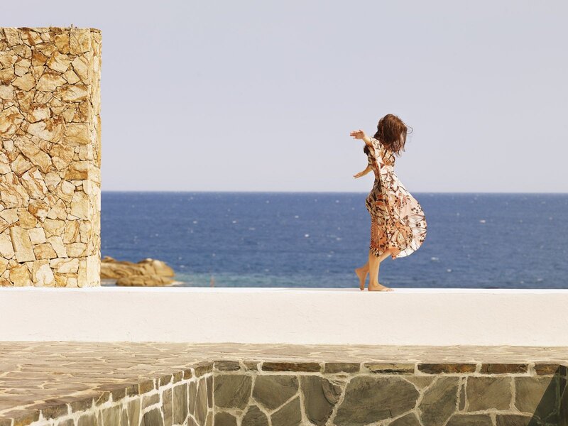 Woman in Patterned Dress — Blue, Serene, Afternoon, Photograph, Ocean