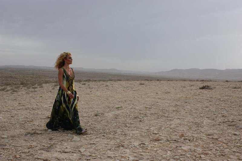 Woman in Patterned Dress — Brown, Dramatic, Photograph, Desert