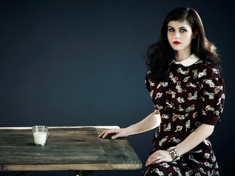 Woman in Patterned Dress — Brown, Dramatic, Photograph, Table