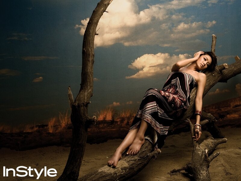 Woman in Patterned Dress — Brown, Dramatic
