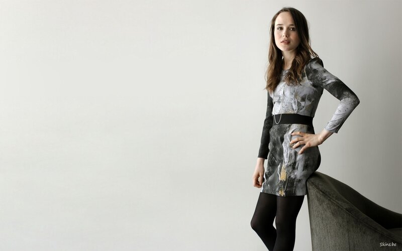 Woman in Patterned Dress — Gray, Neutral, Photograph, Chair