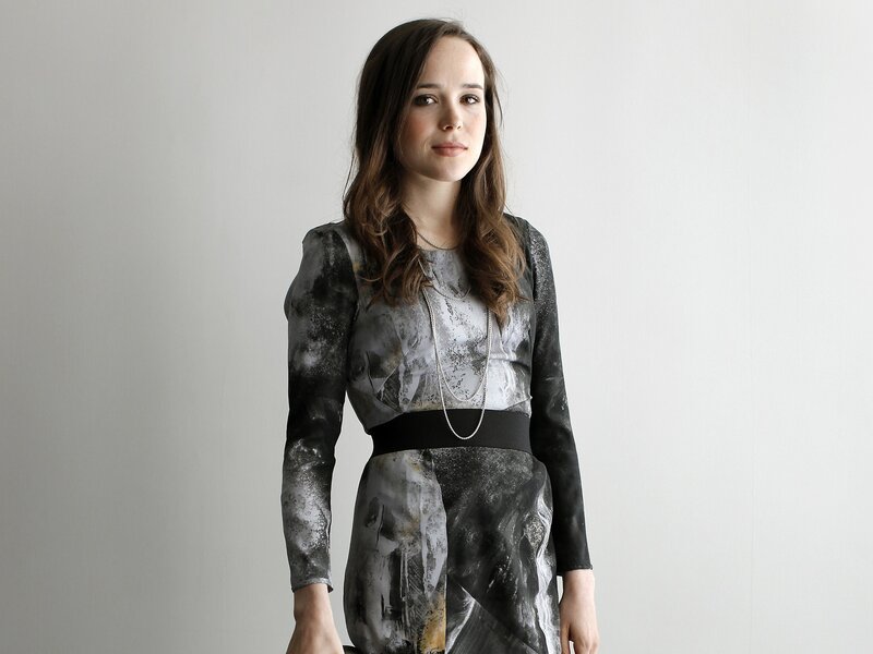 Woman in Patterned Dress — Gray, Neutral, Photograph, Necklace, Wall