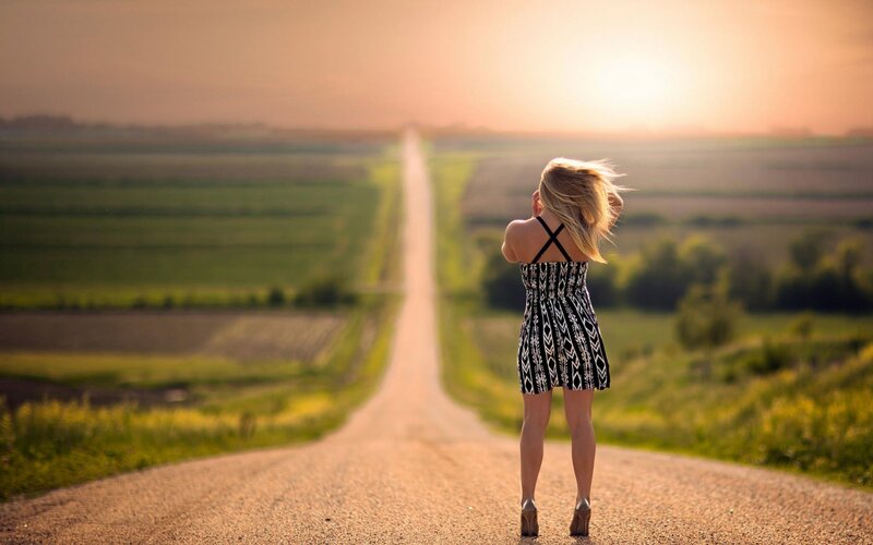 Woman in Patterned Dress — Green, Serene, Sunset