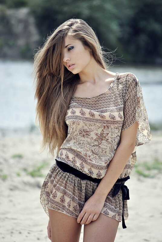 woman in patterned dress on beach