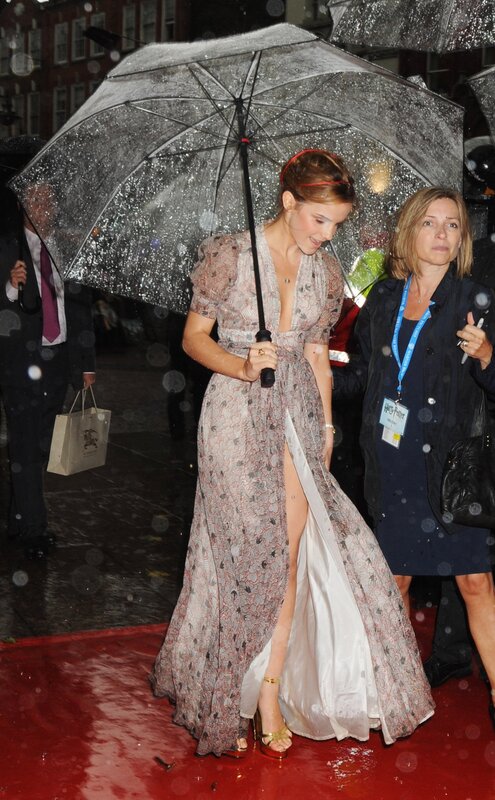 woman in patterned dress on red carpet