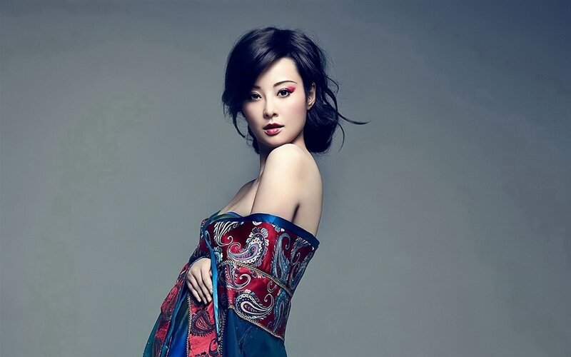 Woman in Patterned Dress — Red, Dramatic, Photograph, Makeup