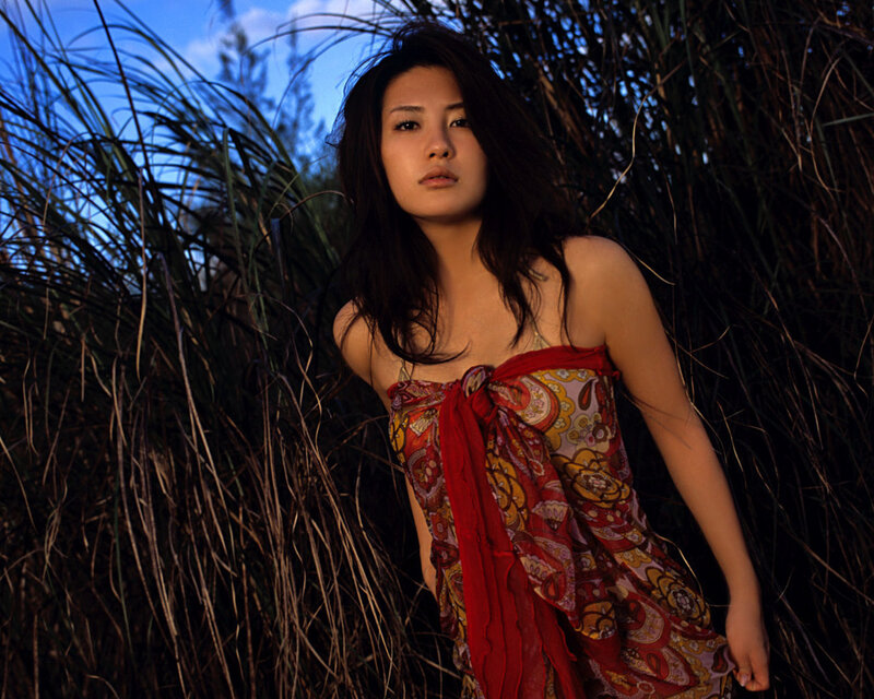 Woman in Patterned Dress — Red, Dramatic, Sunset