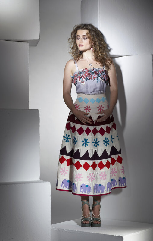 Woman in Patterned Dress — White, Dramatic, Photograph, Sandals