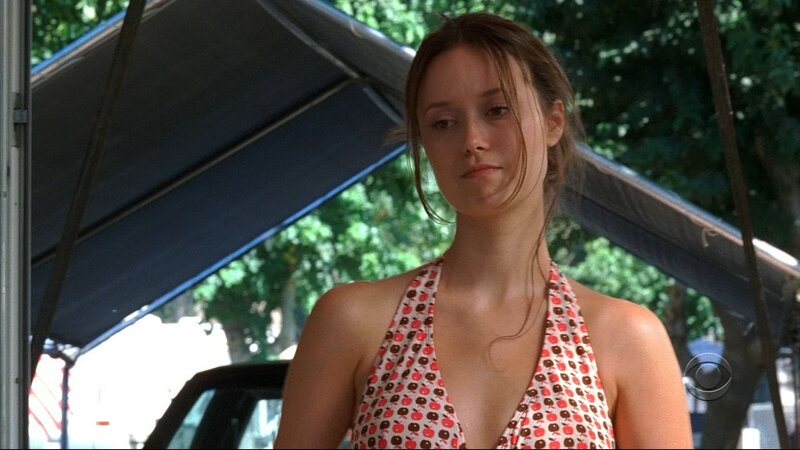 woman in patterned halter top