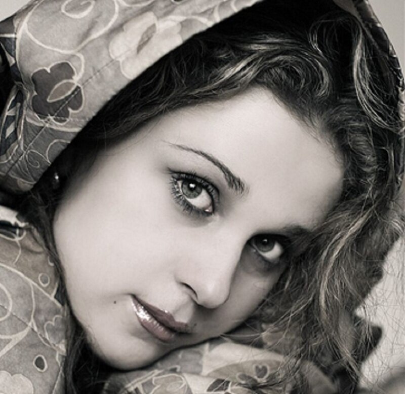 woman in patterned hood