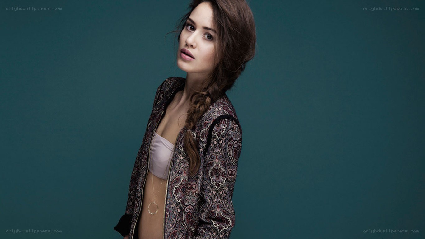 woman in patterned jacket