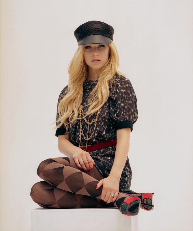 Woman in Patterned Outfit — Black, Confident, Photograph, Hat