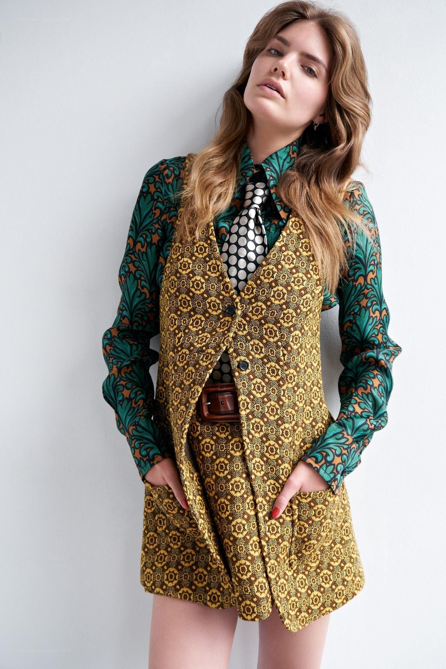 woman in patterned suit
