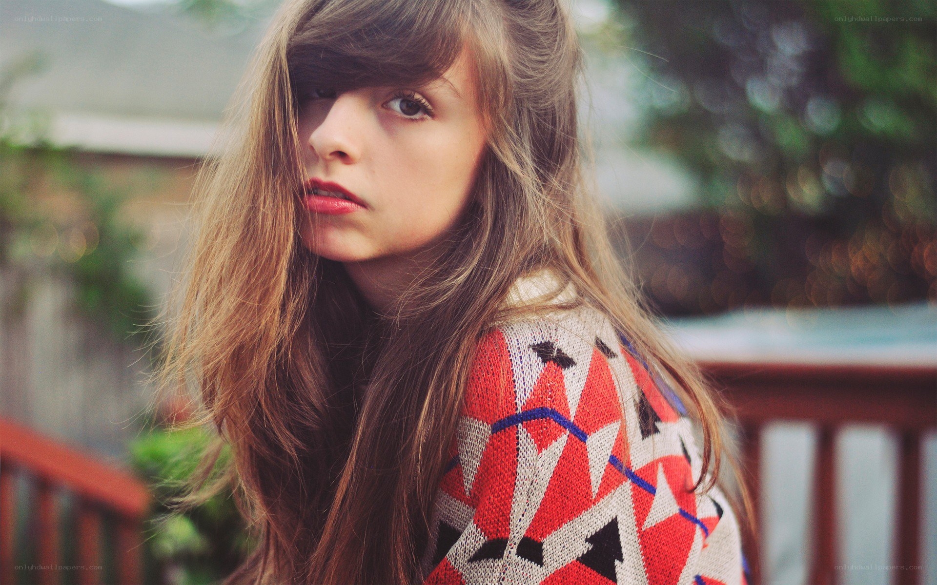 woman in patterned sweater