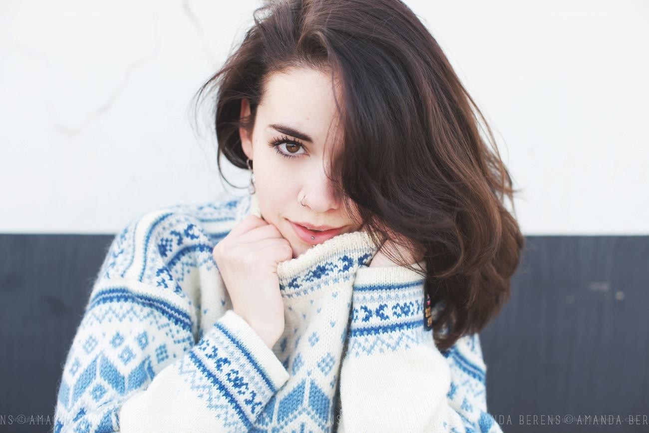 woman in patterned sweater
