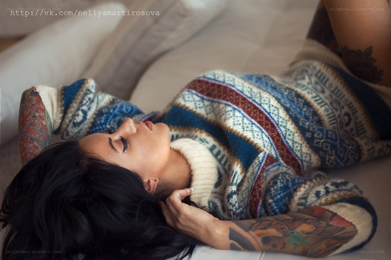 woman in patterned sweater