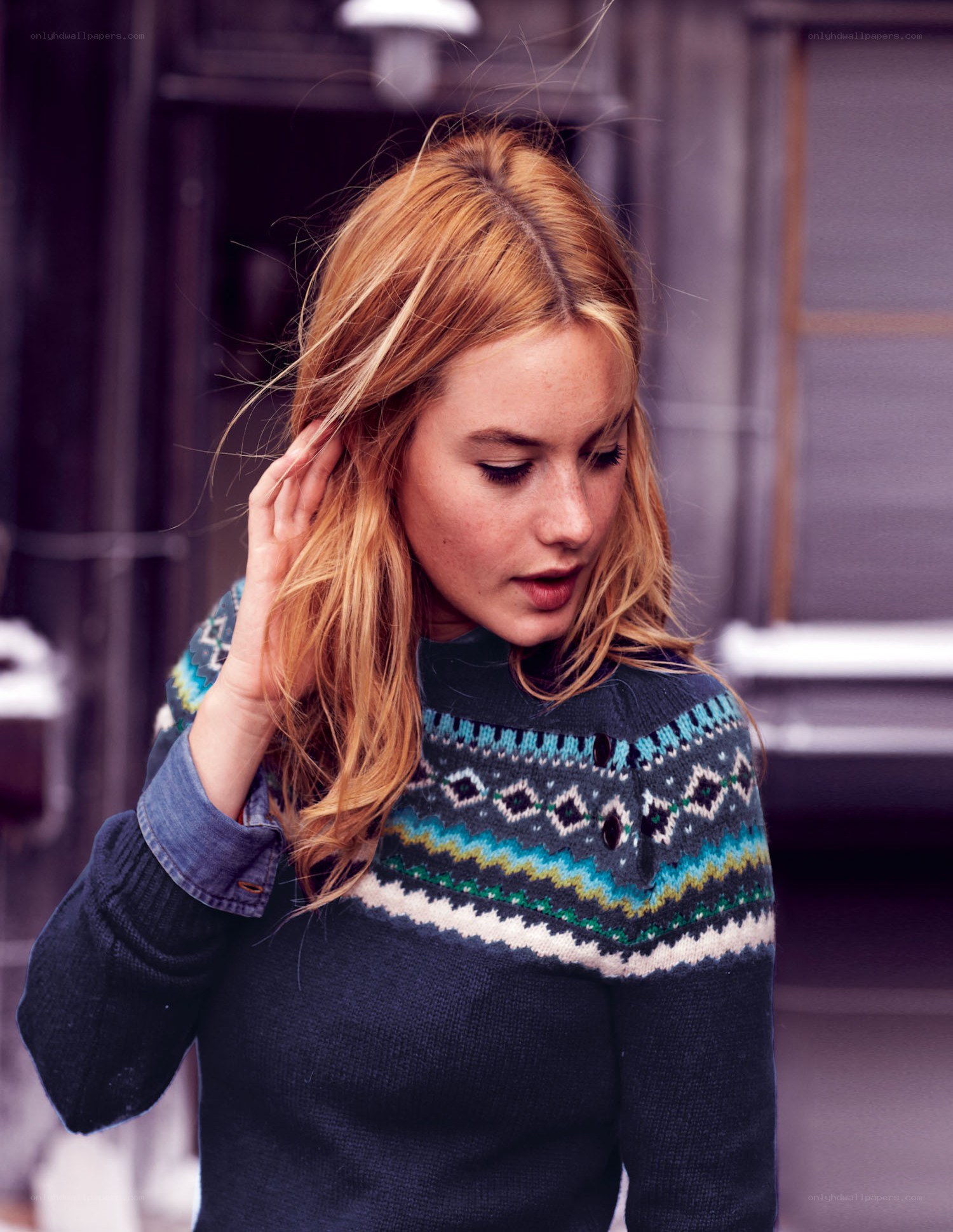 woman in patterned sweater