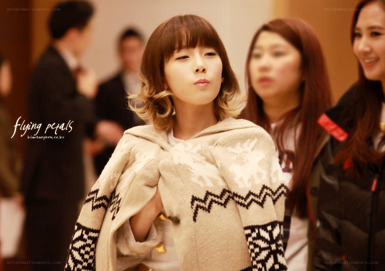 woman in patterned sweater