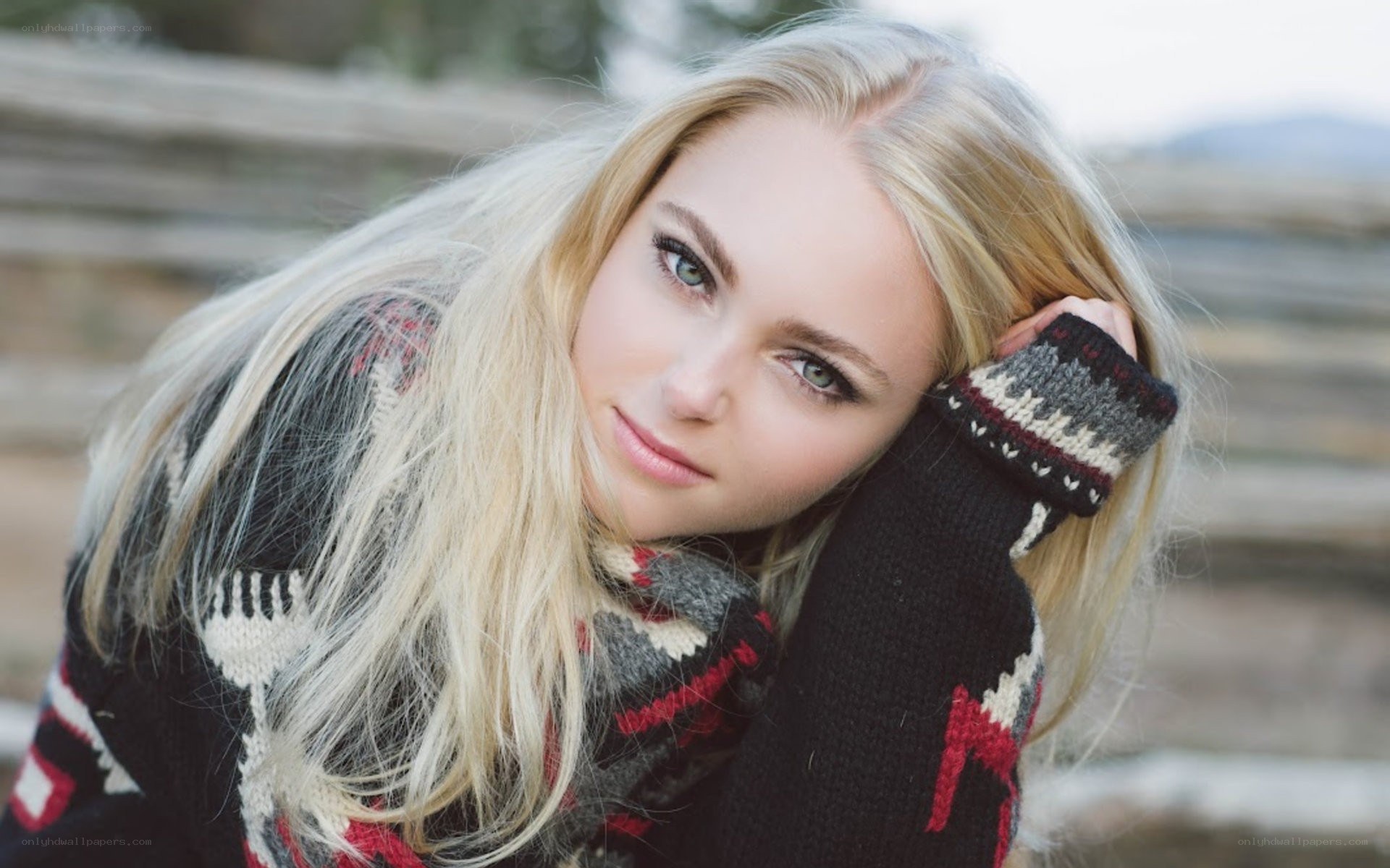 woman in patterned sweater