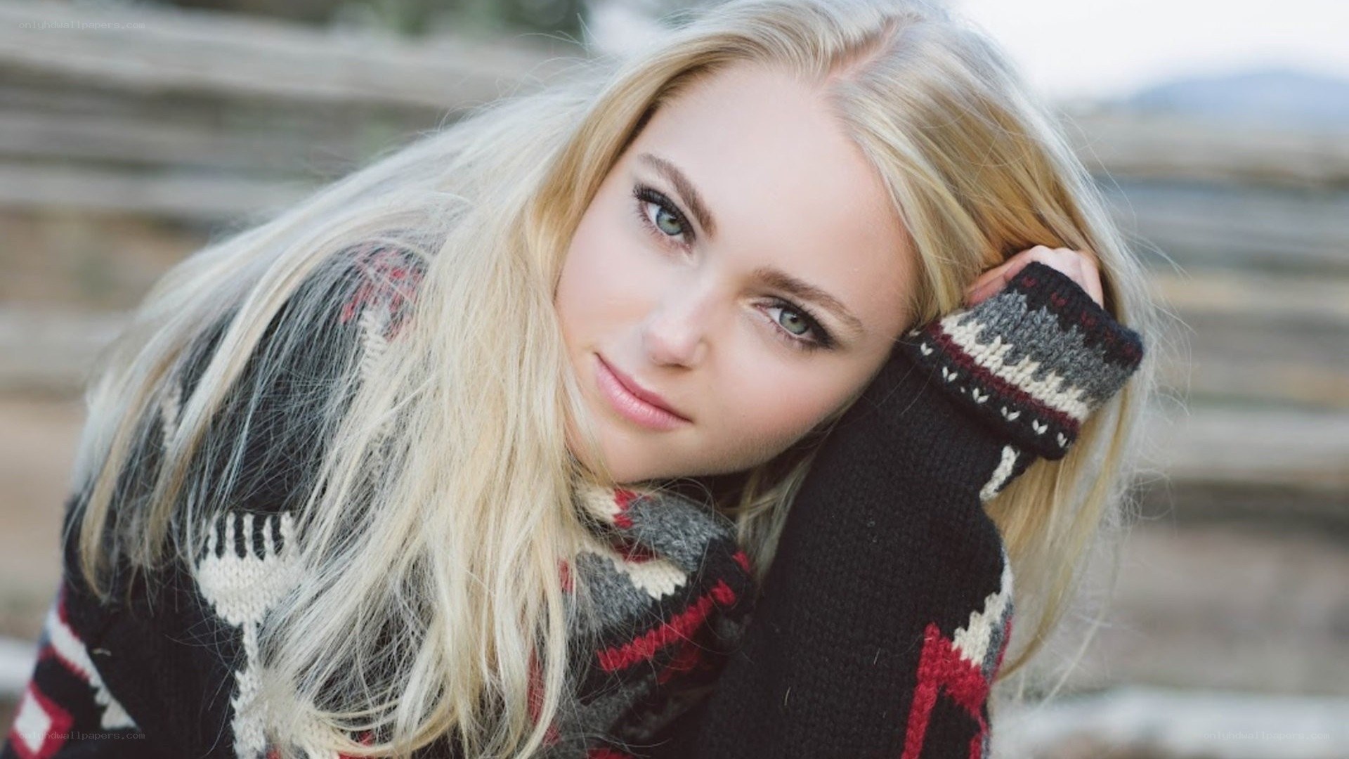 woman in patterned sweater
