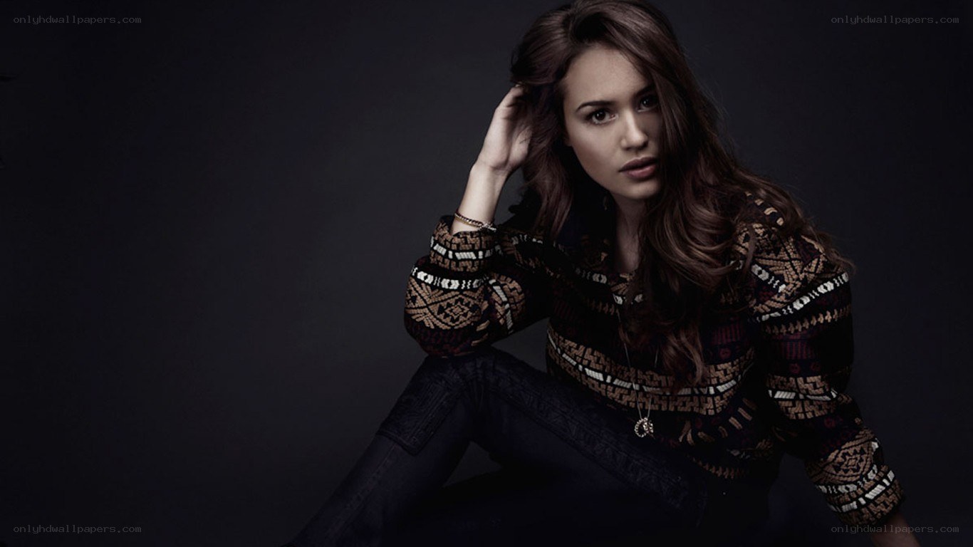 woman in patterned sweater