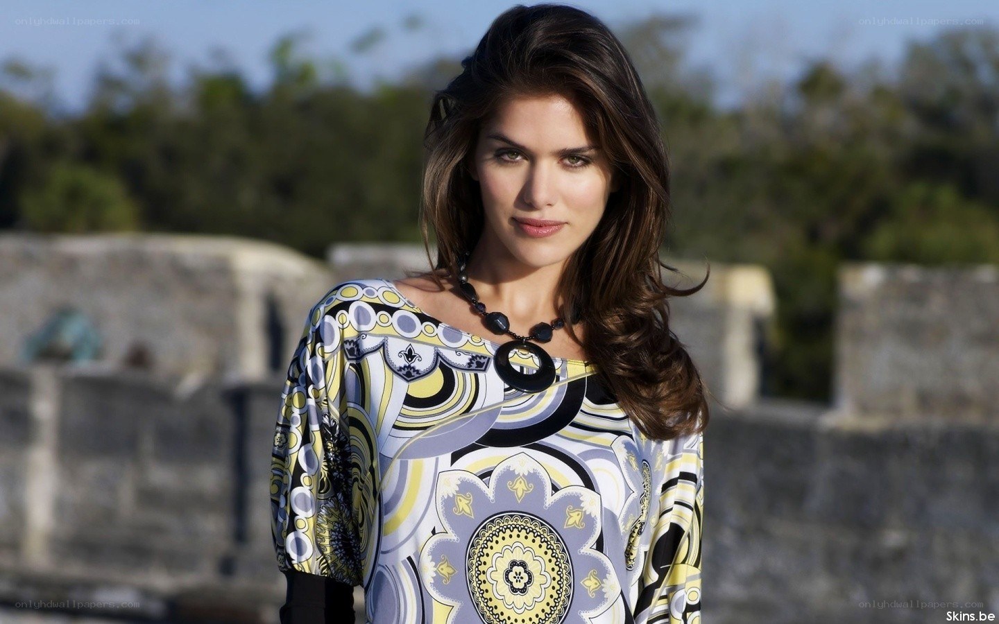 woman in patterned top