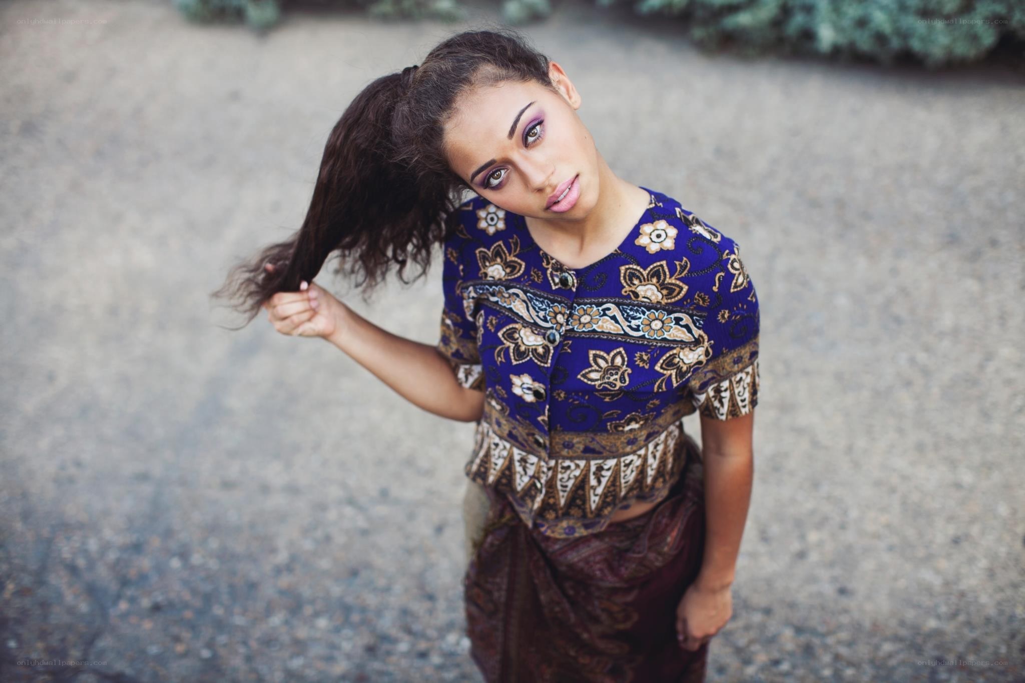woman in patterned top