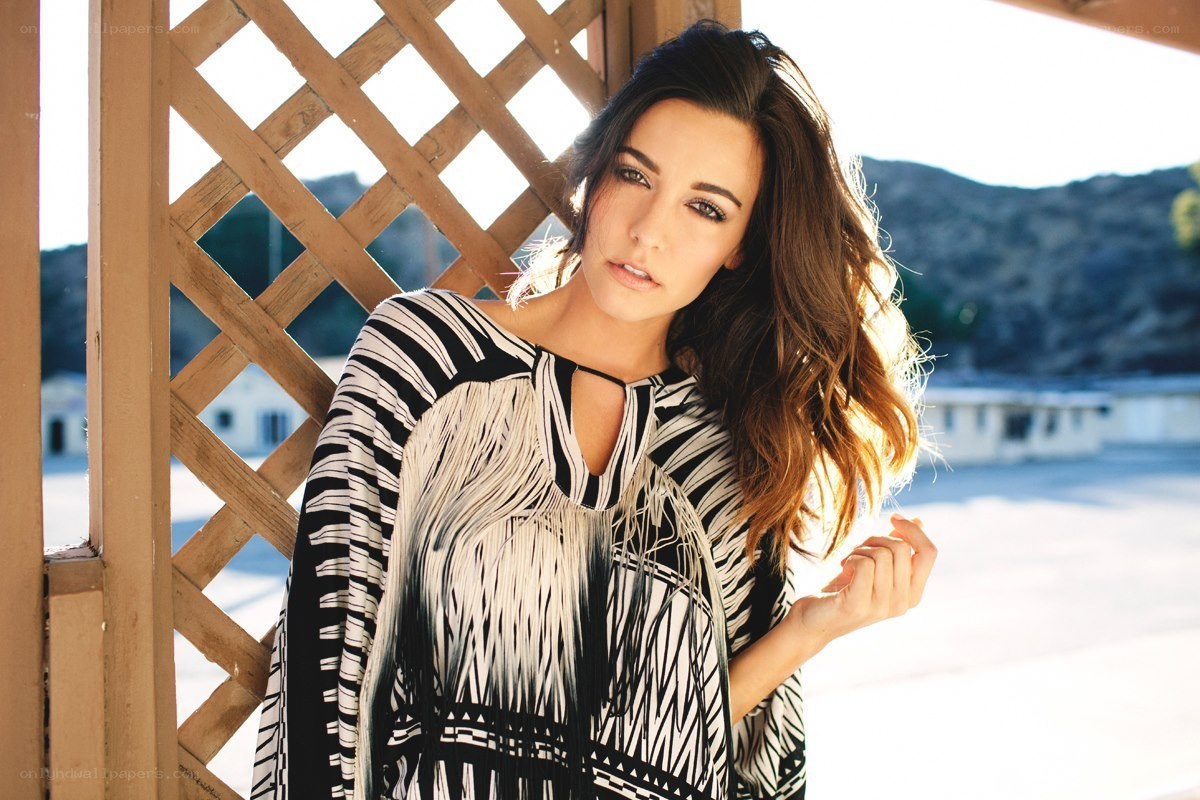 woman in patterned top
