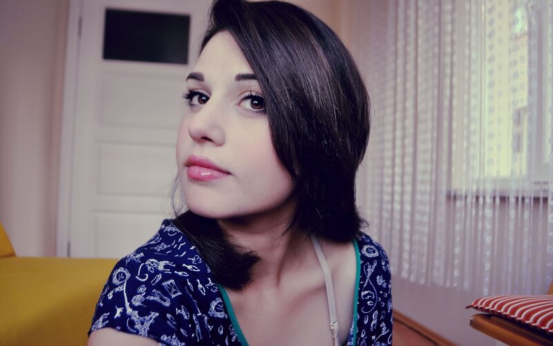 woman in patterned top