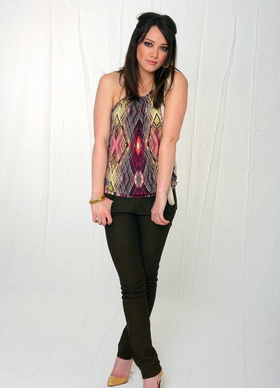woman in patterned top and jeans