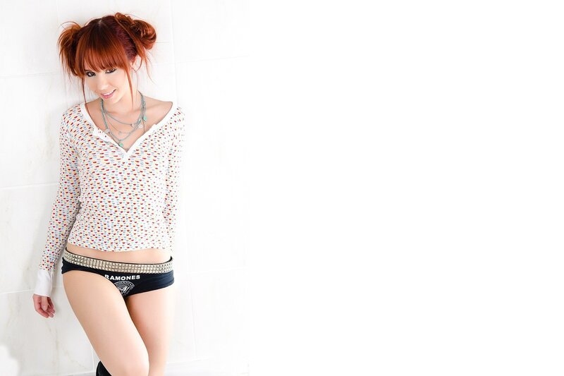Woman in patterned top and underwear