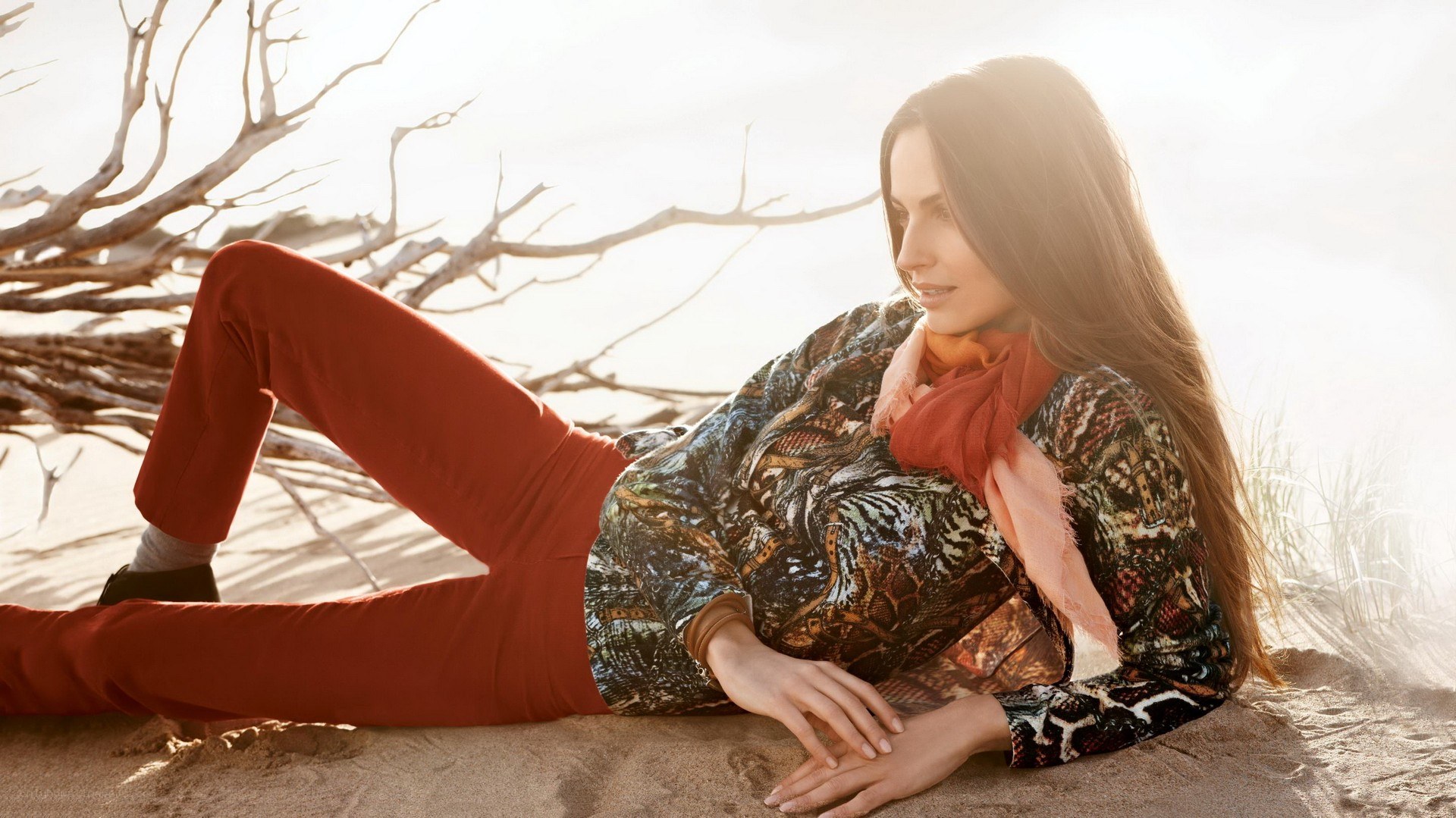 woman in patterned top on beach