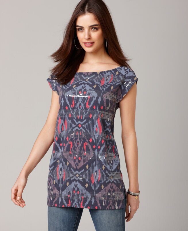 woman in patterned tunic