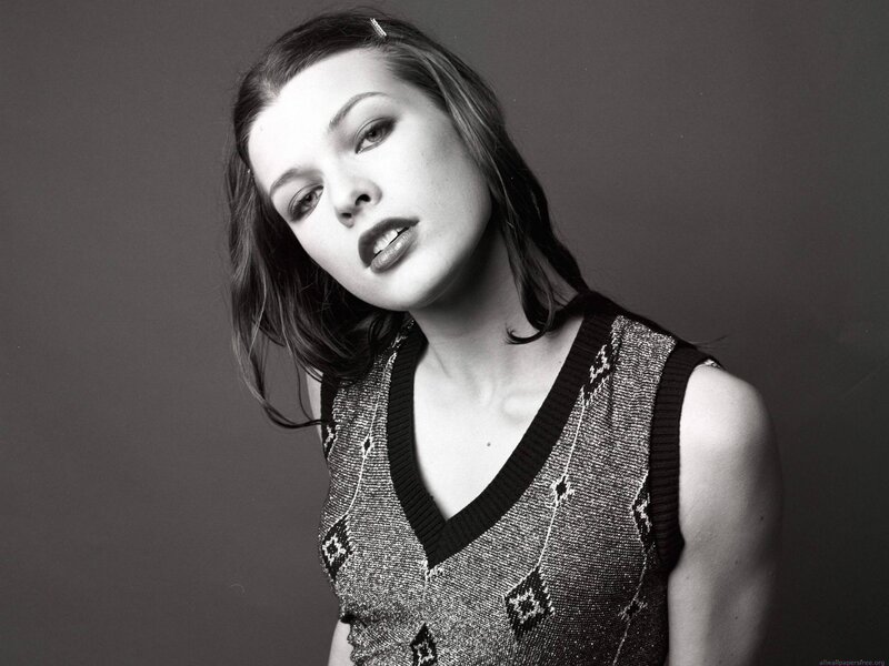 woman in patterned vest