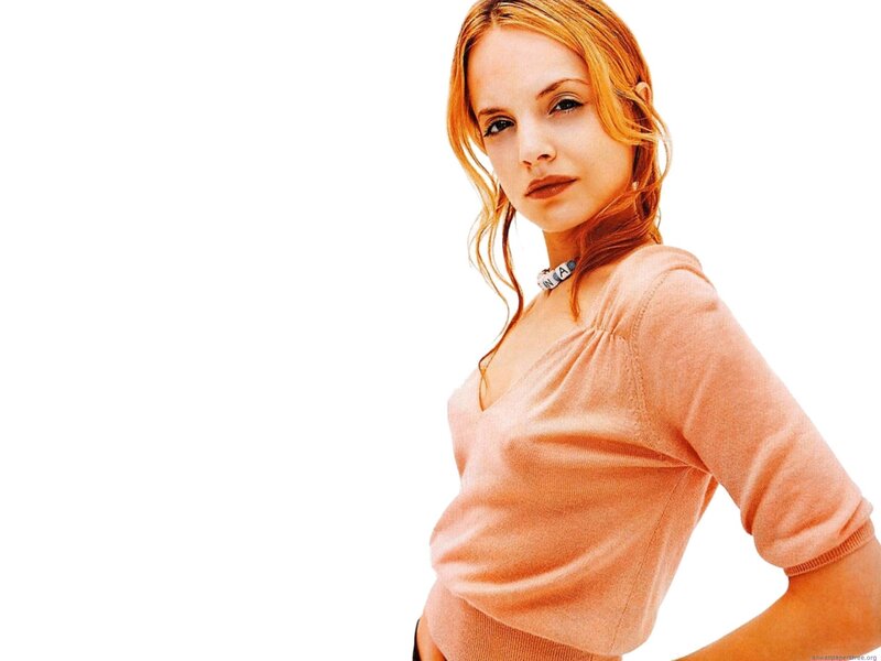 woman in peach sweater