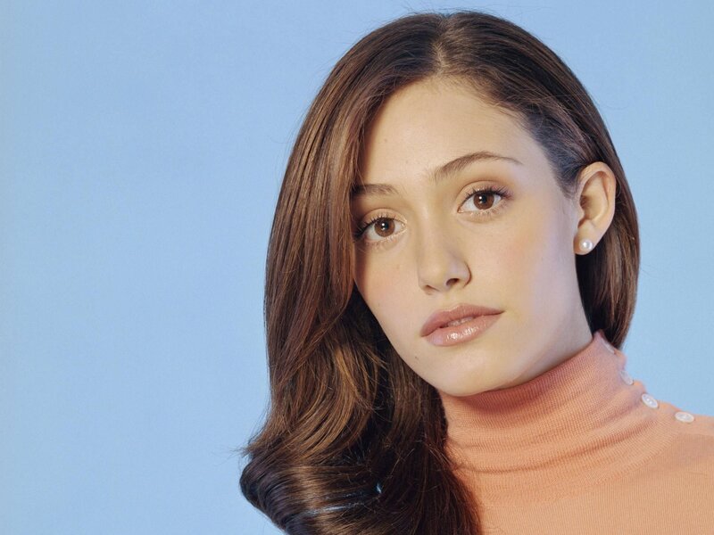 woman in peach turtleneck